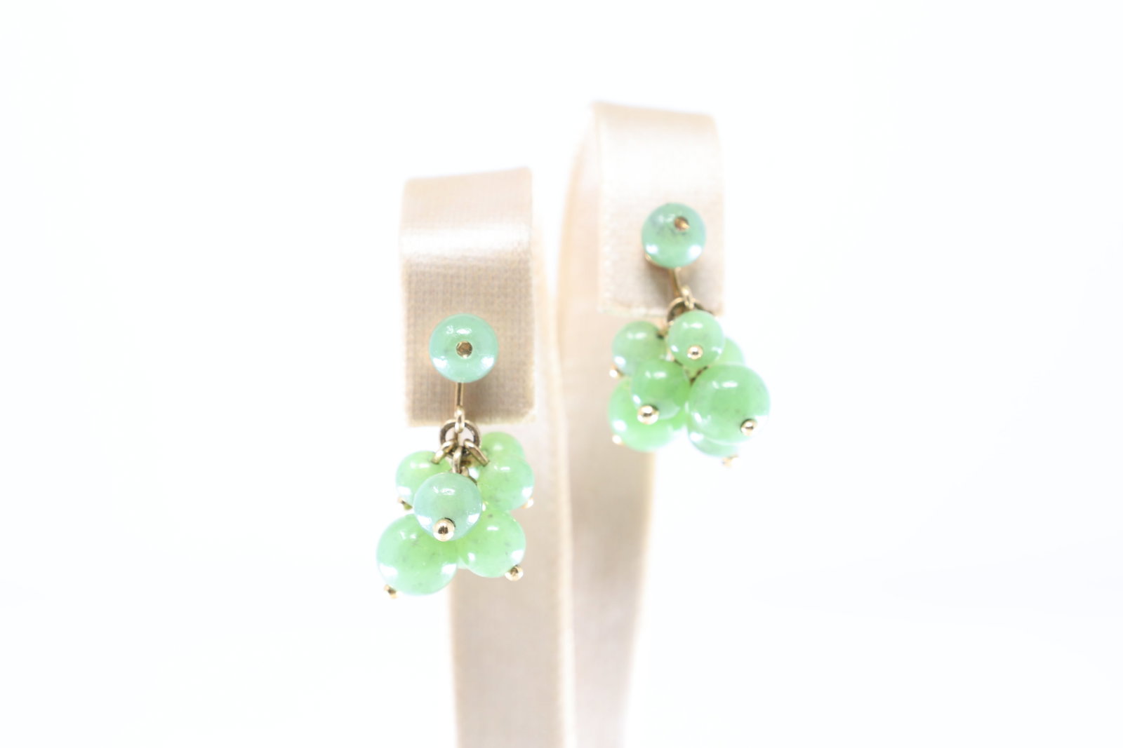 Jade Stud Earring 14Kt.: Ladies 14Kt Yellow Gold Jade Stud Earring. green jade earrings are a perfect blend of elegance and charm. Crafted with care, they feature a cluster design that adds a playful touch to any outfit.