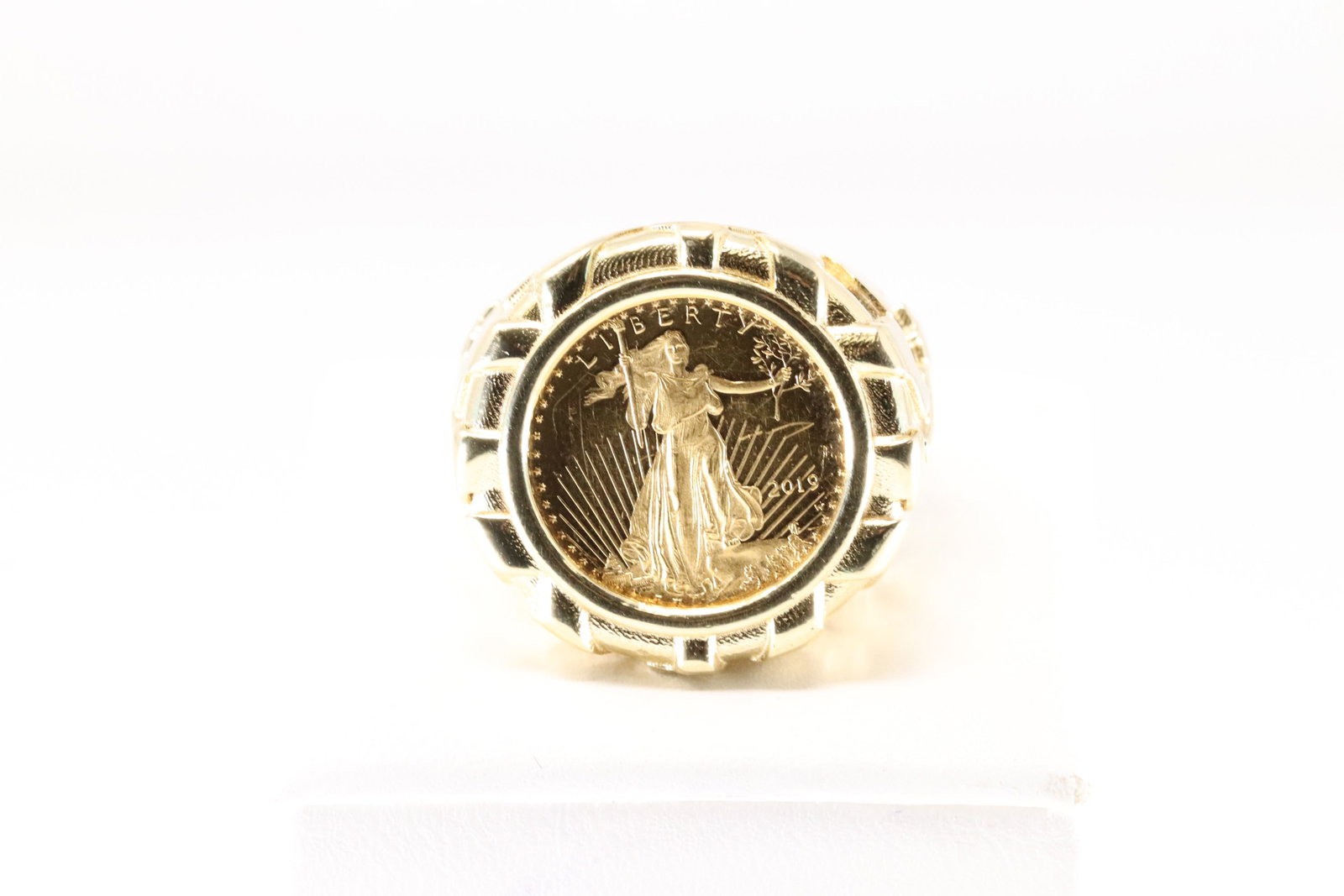 Liberty Coin / Nugget Ring 14K.: 14Kt Yellow Gold Nugget Ring / Liberty Coin. This Elegant Ring has Walking Liberty Coin 22K with AcFramed 14K Nugget Design. Ring size: 9.25. Total weight: 13.00 Grams.