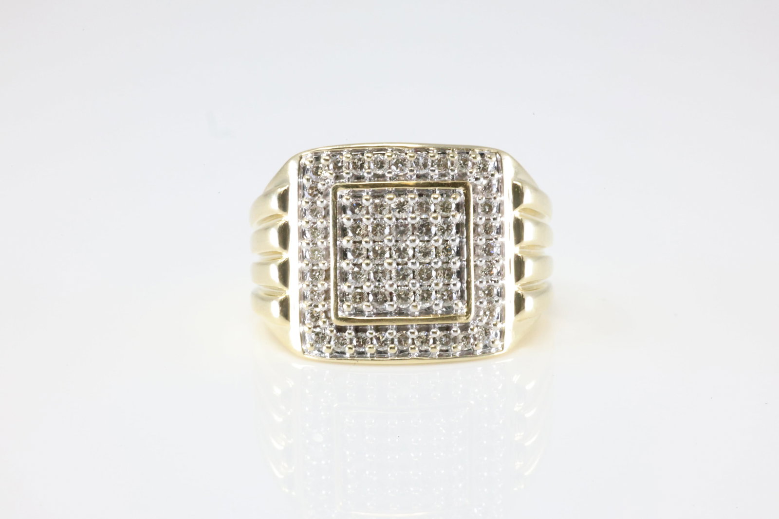 Elegant Diamond Ring 10Kt.: Men 10Kt Yellow Gold Diamond Ring. This Elegant Ring has 57 Sparkling Diamonds. Diamonds weight approx: 1.00cttw. Ring size: 10.00. Total weight: 7.85 Grams.
