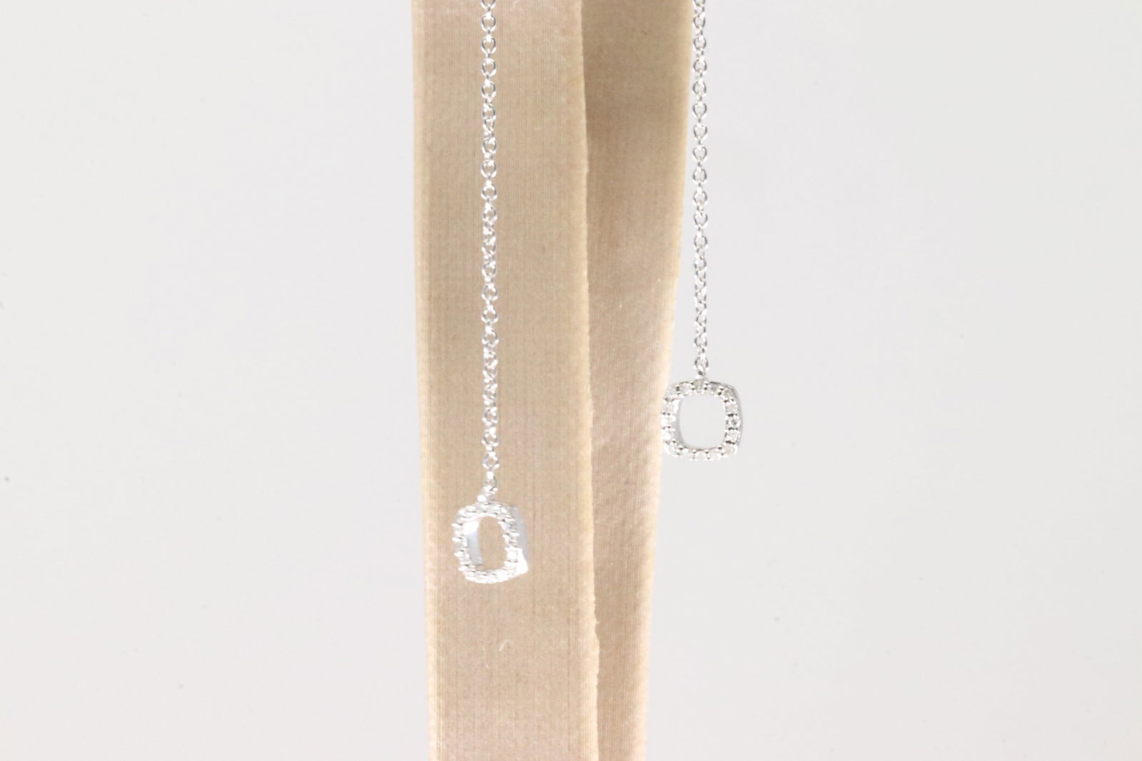 Diamond Stud & Dangling Earring 14Kt.: Ladies 14Kt White Gold Diamond Stud & Dangling Earring. This Beautiful Stud & Dangling Earring's with 46 Sparkling Diamonds. Diamonds weight: 0.17ctw.