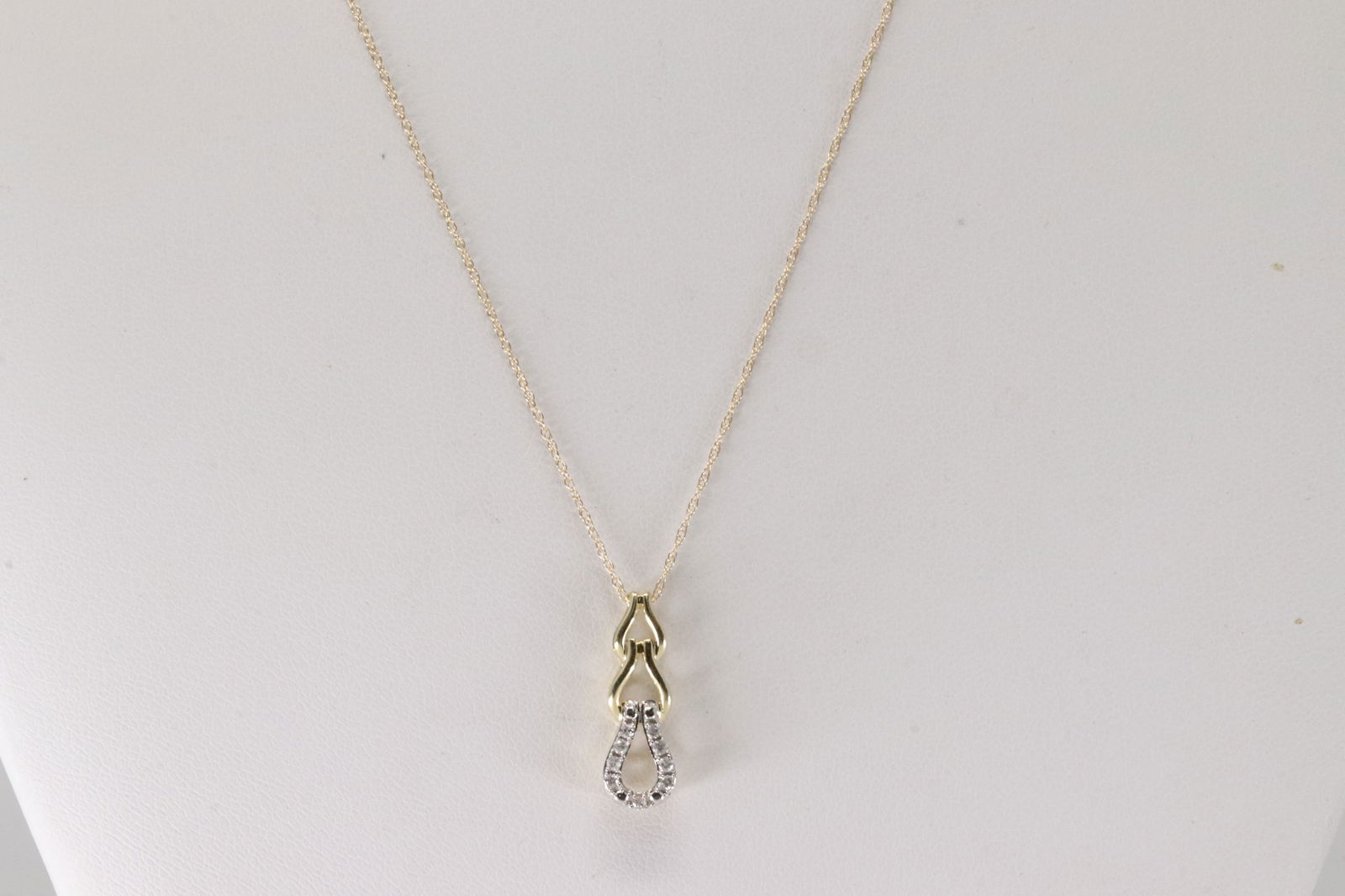 Diamond Pendant / Necklace 10Kt.: 10Kt Yellow Gold Diamond Pendant / Necklace. This Elegant Pendant has Sparkling Diamonds with A 10K Necklace. Diamonds weight: 0.10ctw. Necklace length: 18.00'