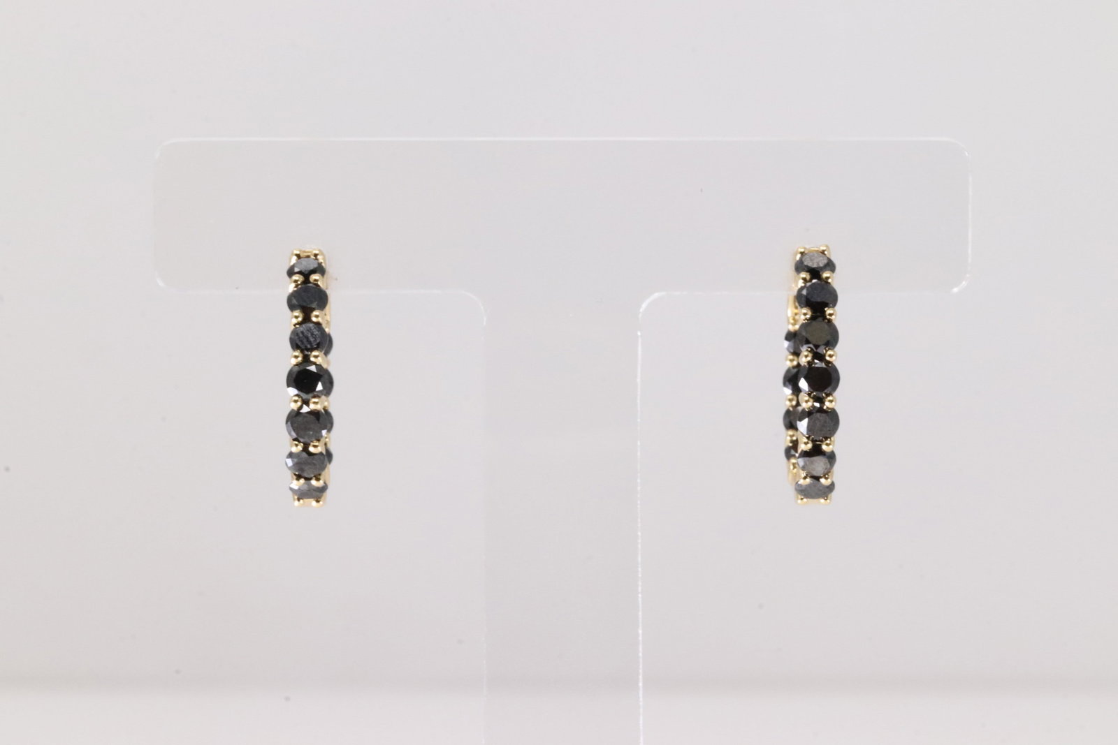 Sapphire Hoop Earring 18Kt.: Ladies 18Kt Yellow Gold Sapphire Hoop Earring. This Charming Earring's has In & Out Sapphire Gemstones. Total Weight: 5.00 Grams.