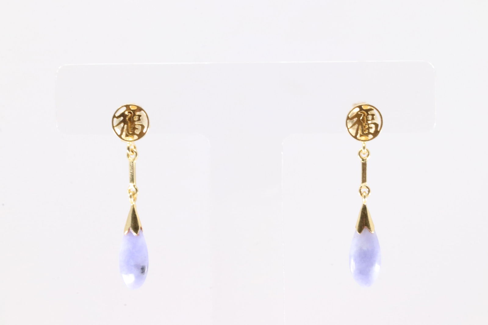 Blue Chalcedony Stud Earring 14Kt.: Ladies 14Kt Yellow Gold Blue Chalcedony Stud Earring. This Gorgeous Earring's has Blue Chalcedony Oval Gemtones.
