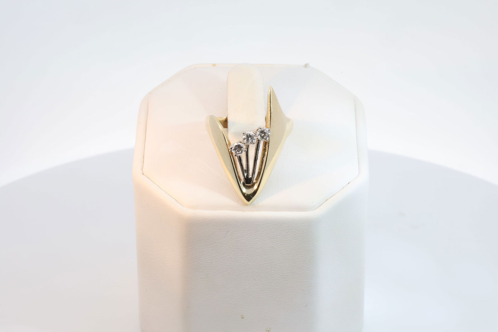 Diamond Ring 14Kt.: Ladies 14Kt Yellow Gold Diamond Ring. Ring has V Design & 3 Brilliants Diamonds. Diamonds weight approx: 0.10ctw. Ring size: 9.25. Total weight: 4.40 Grams.