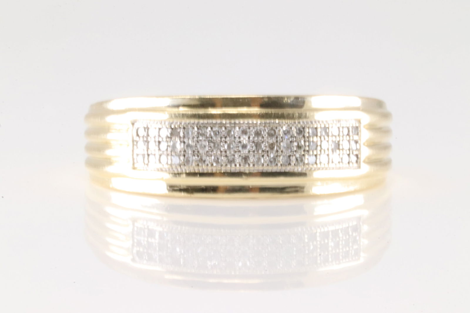 Wedding Diamond Ring 14Kt.: 14Kt Yellow Gold wedding Diamond Ring. Ring has 3 row with smaller brilliants diamonds. Diamonds weight approx: 0.25ctw.Ring size: 9.50. Total weight: 4.70 Grams.