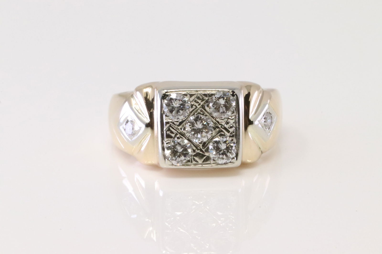 Diamond Ring 14Kt.: 14Kt Yellow Gold Diamond Ring. Ring has 7 round Diamonds. Diamonds weight: 0.50ctw. Ring size: 9.25. Total weight: 7.60 Grams.