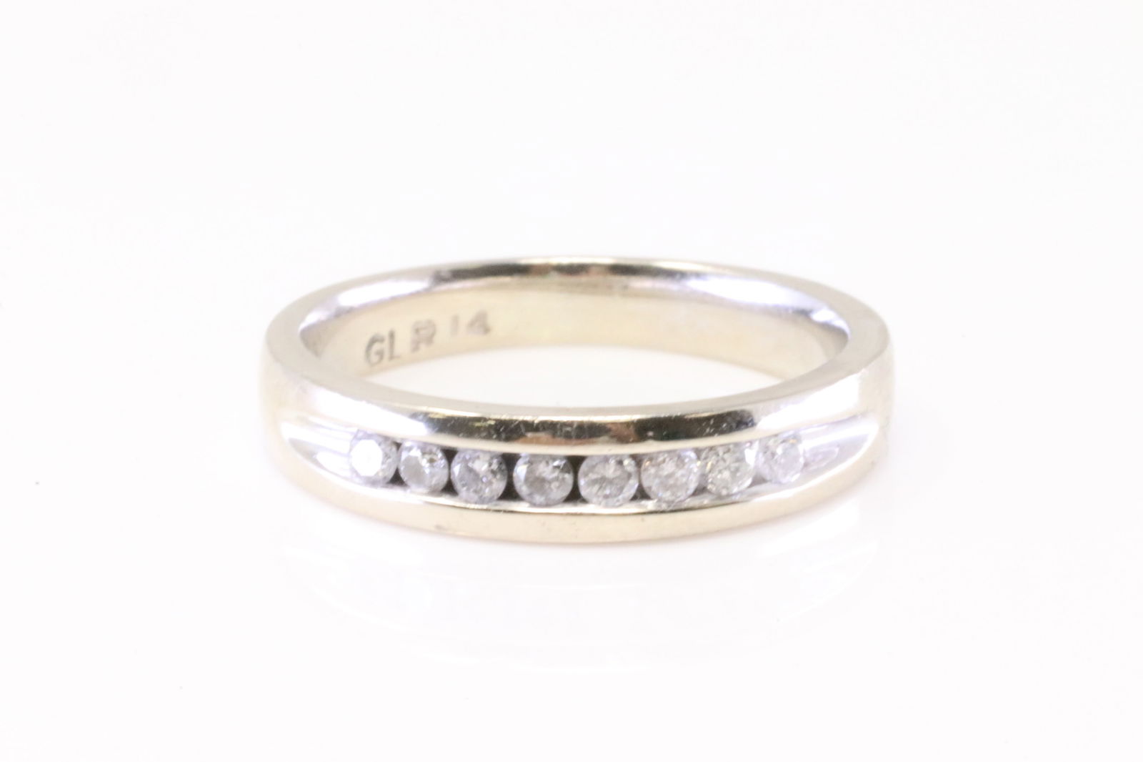 Wedding Diamond Ring 14Kt.: Ladies 14Kt White Gold Wedding Diamond Ring. Ring has 8 round Diamonds. Diamonds weight approx: 0.25ctw. Ring size: 8.50. Total weight: 4.60 Grams.