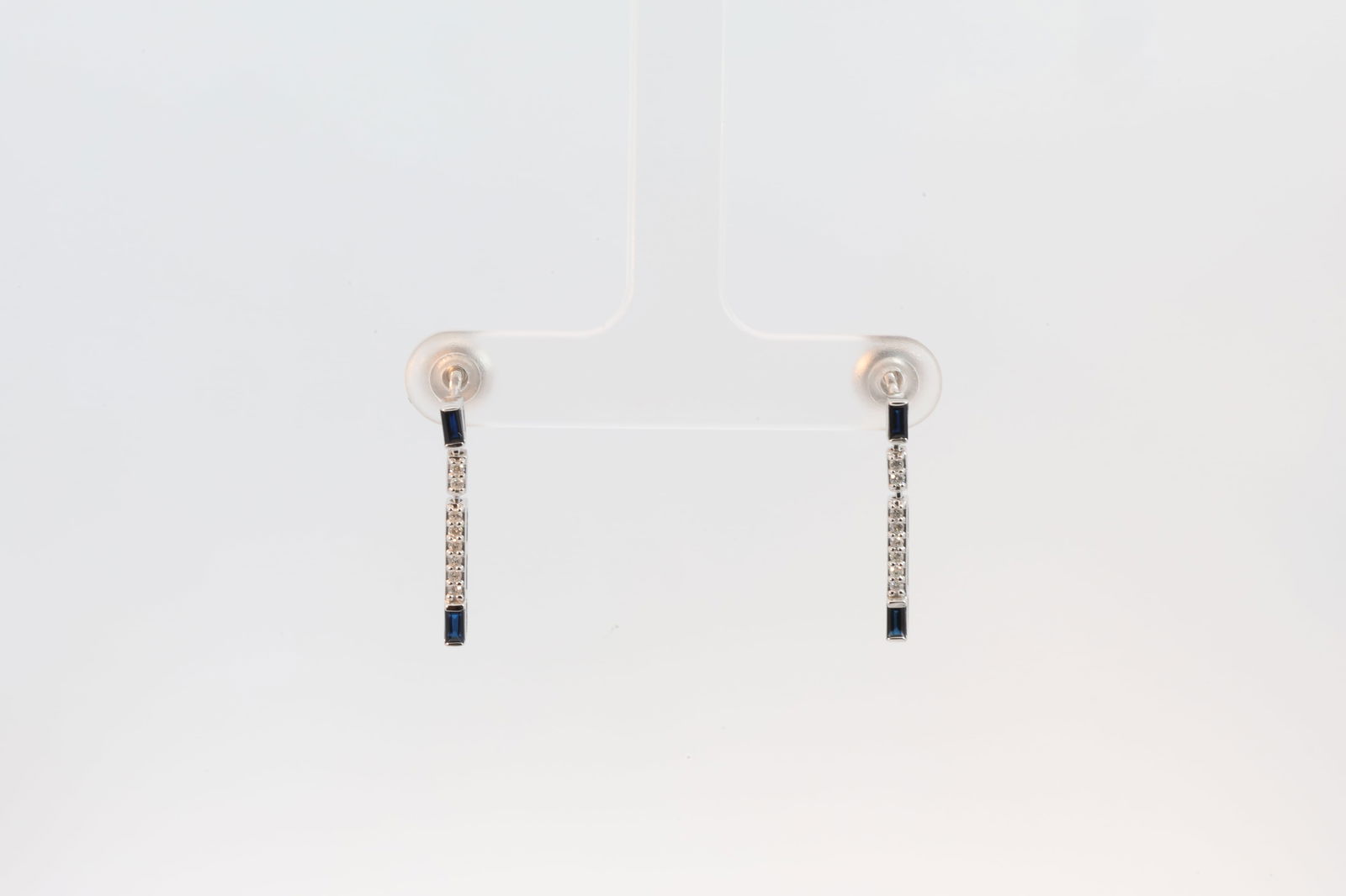 Sapphire & Diamond Stud Earring 14Kt.: Ladies 14Kt White Gold Sapphire & Diamond Stud Earring. Earring's has 4 Cut Sapphire with 16 round Diamonds. Diamonds weight: 0.10ct. Sapphire's weight: 0.31ct.