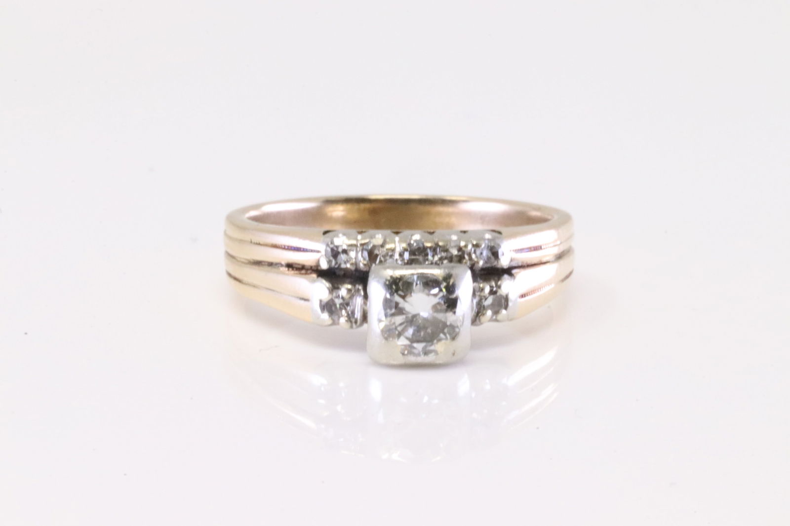 Diamond Ring 14Kt.: Ladies 14Kt Yellow Gold Diamond Ring. Ring has Double Band with 8 round Diamonds. Diamonds weight: 0.85ctw. Ring size: 7.00. Total weight: 4.70 Grams.