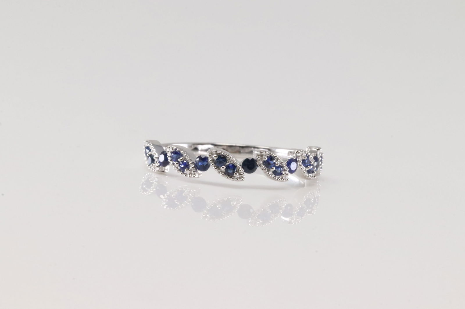 Sapphire Ring 10Kt.: ladies 10Kt White Gold Sapphire Ring. This Charming Ring has round Blue Sapphires. Ring size: 7.00.