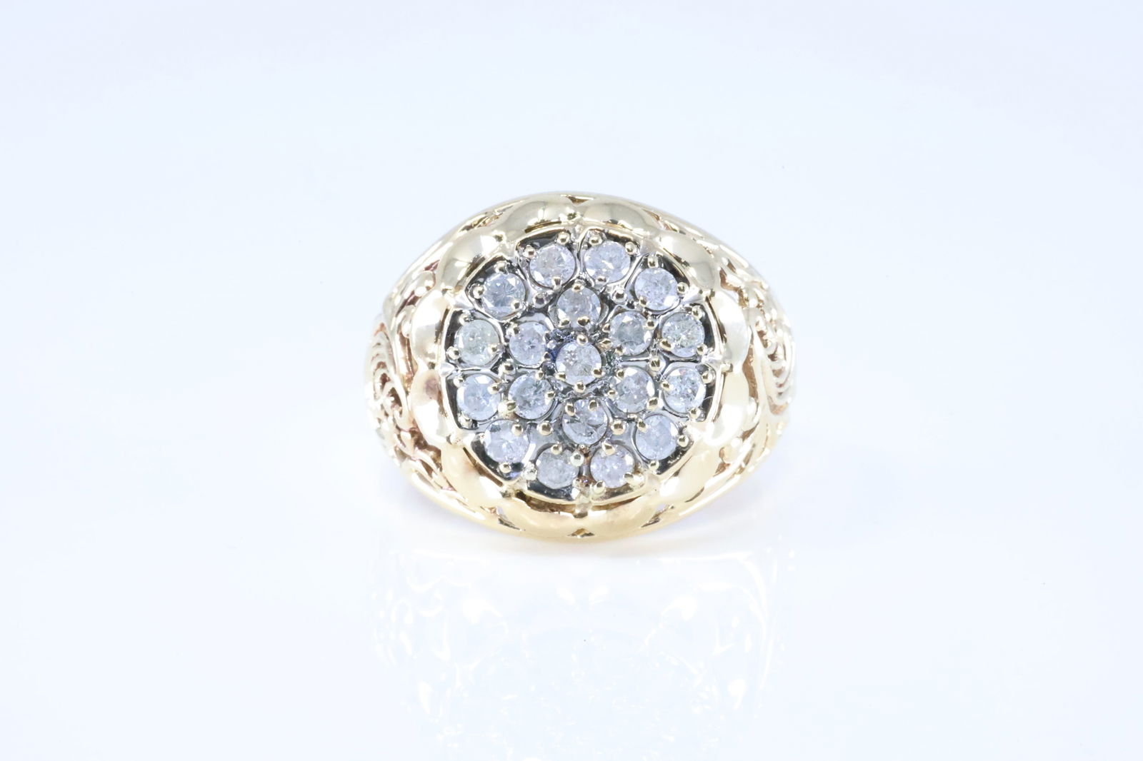 Diamond Ring 10Kt.: Ladies 10Kt Yellow Gold Diamond Ring. This Elegant Ring has Flower Design with 19 Sparkling Diamonds. Diamonds weight approx: 0.75ctw. Ring size: 10.00. Total weight: 7.16 Grams.
