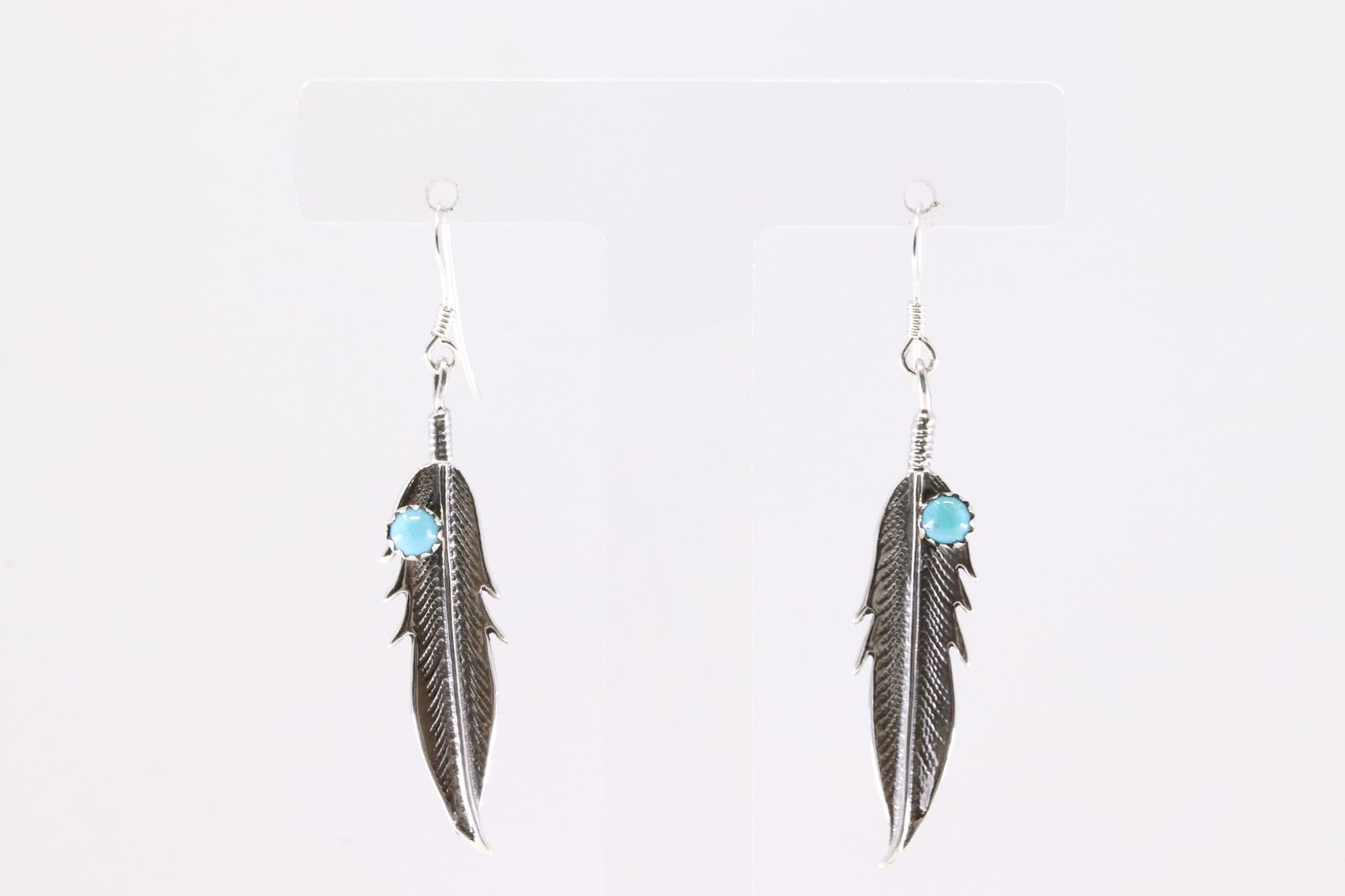 America Sterling Silver Turquoise Feather Dangling Earring's.: This is a America Sterling Silver Turquoise Feather Dangling Earring's.