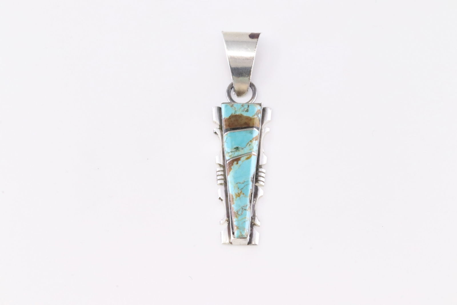 Native America Navajo Sterling Silver Turquoise Inlay Pendant By S.F.: This is a Native America Navajo Sterling Silver Turquoise Inlay Pendant By S.F.