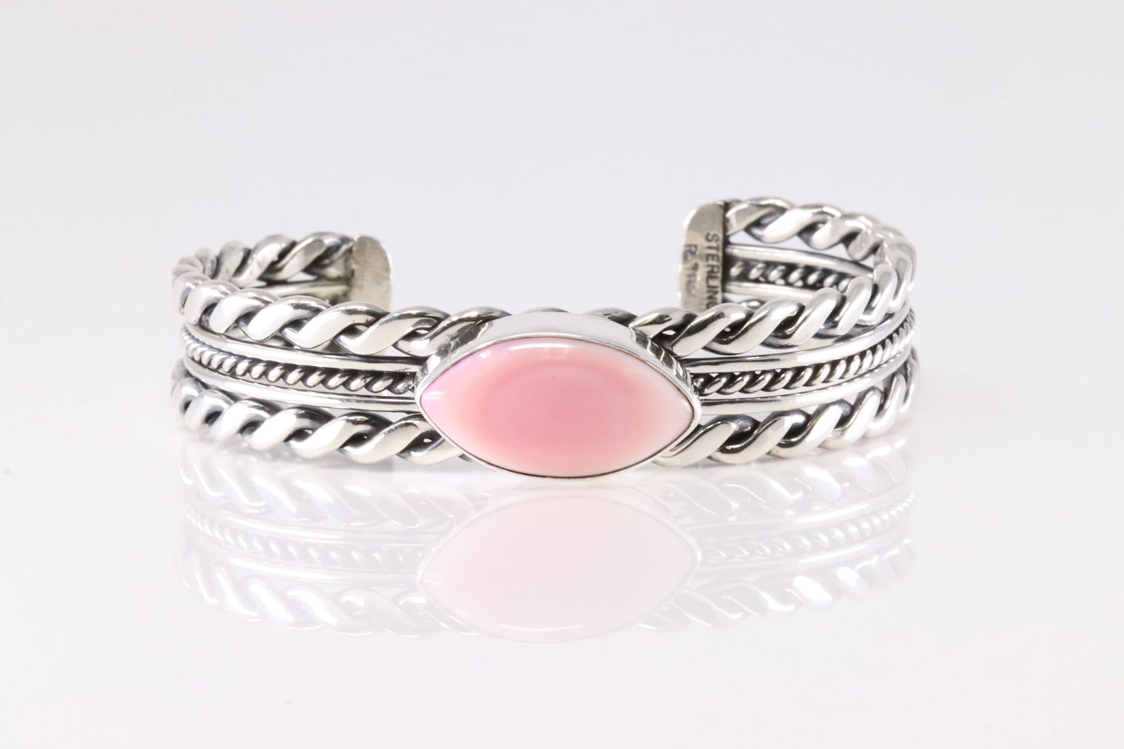 Native America Navajo Sterling Silver Pink Conch Bracelet Cuff By Roy Tom.: This is a Native America Navajo Sterling Silver Pink Conch Bracelet Cuff By Roy Tom. Stamp R.Tom.