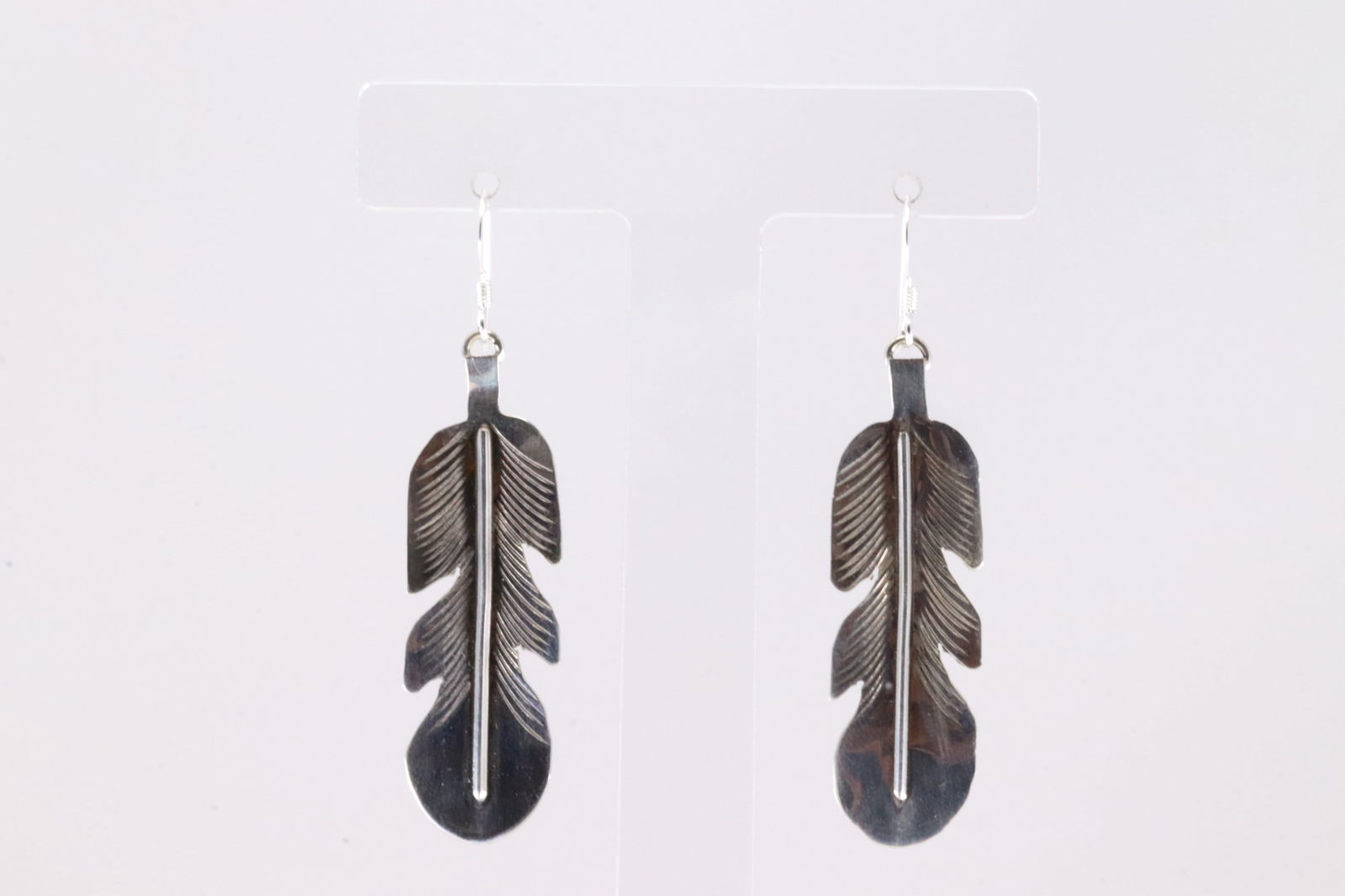 Native America Navajo Sterling Silver Stamped Feather Dangling Earring's By Aaron Davis.: This is a Native America Navajo Sterling Silver Stamped Feather Dangling Earring's By Aaron Davis. Stamp AD.