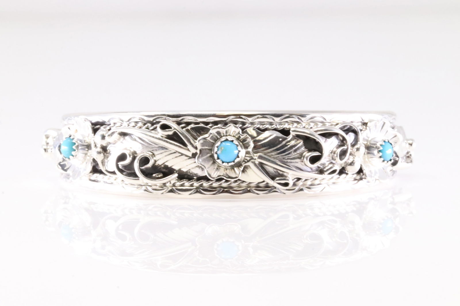 Native America Navajo Sterling Silver Turquoise Bracelet Floral Cuff By Bessie Joe.: This is a Native America Navajo Sterling Silver Turquoise Bracelet Floral Cuff By Bessie Joe.