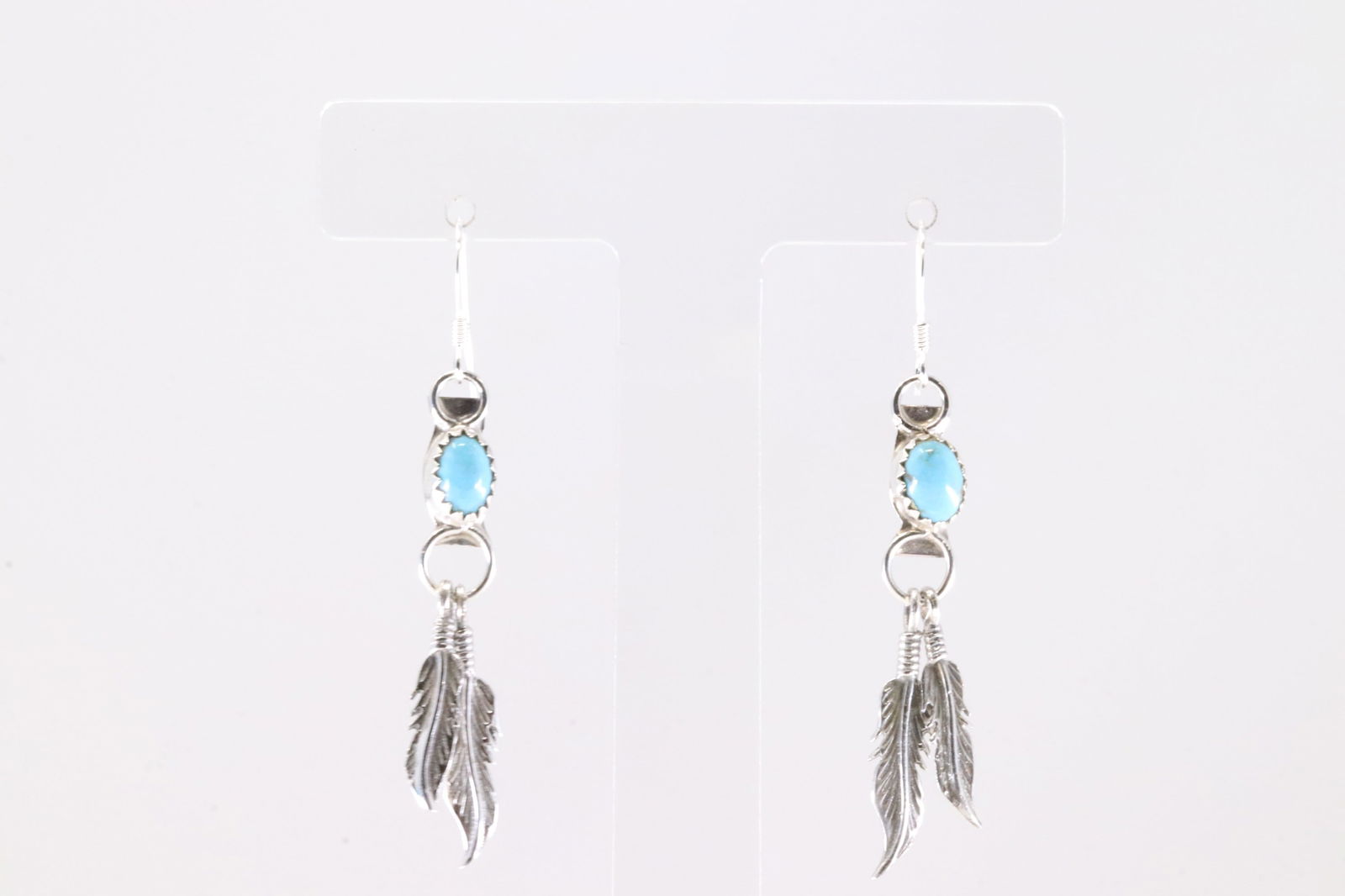 America Sterling Silver Turquoise Feather Dangling Earring's.: This is a America Sterling Silver Turquoise Feather Dangling Earring's.