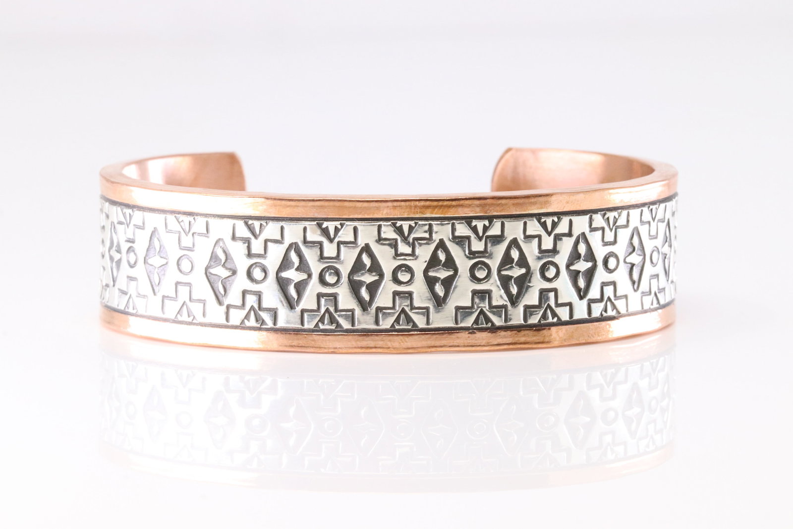 Native America Copper Sterling Silver Stamped Bracelet Cuff By Wylie Secatero.: This is a Native America Copper Sterling Silver Stamped Bracelet Cuff By Wylie Secatero. Stamp Wylie Secatero.