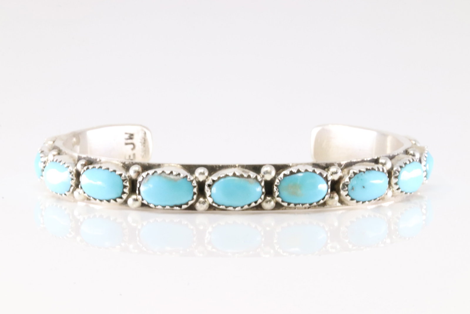 Native America Zuni Sterling Silver Turquoise Bracelet Cuff By Eunis Tso.: This is a Native America Zuni Sterling Silver Turquoise Bracelet Cuff By Eunis Tso. Stamp EJW.