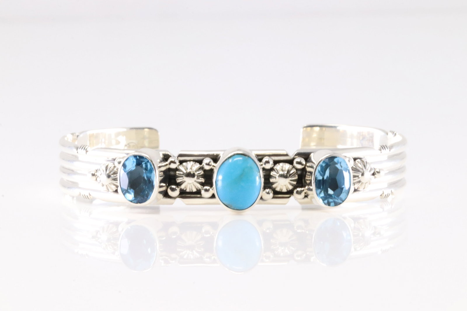 Native America Navajo Sterling Silver Blue Topaz & Turquoise Bracelet Cuff By Gilbert Smith. From: This is a Native America Navajo Sterling Silver Blue Topaz & Turquoise Bracelet Cuff By Gilbert Smith. From R.B Company. Stamp By R.B Company.