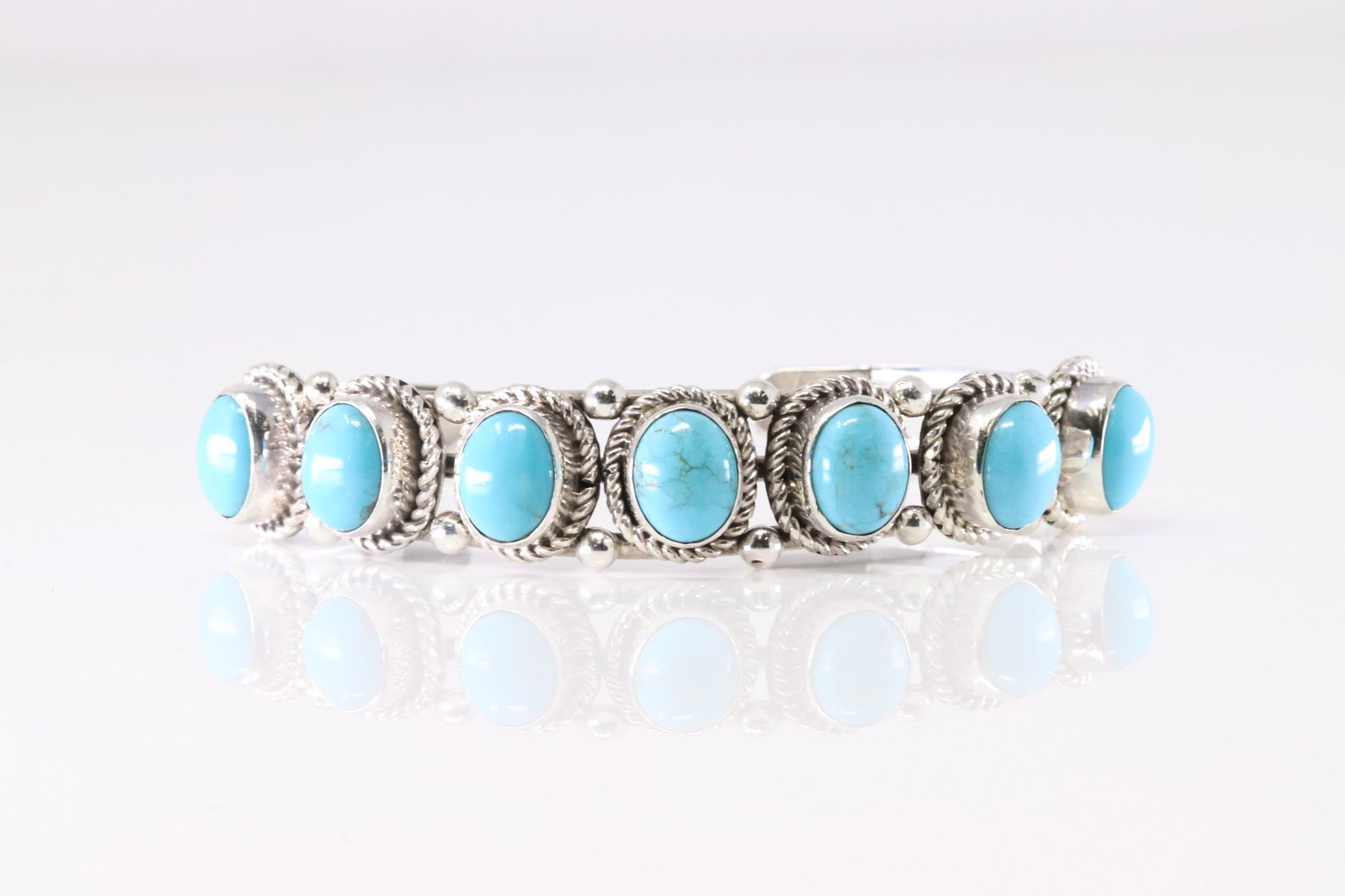 Native America Navajo Sterling Silver Turquoise 7 Stone Bracelet Cuff By Sheena Jack. From R.B: This is a Native America Navajo Sterling Silver Turquoise 7 Stone Bracelet Cuff By Sheena Jack. From R.B Company. Stamp By R.B Company.