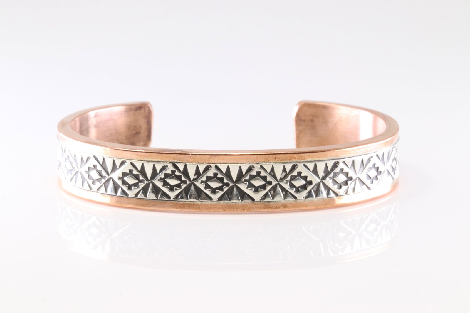 Native America Copper Sterling Silver Stamped Bracelet Cuff By Wylie Secatero.: This is a Native America Copper Sterling Silver Stamped Bracelet Cuff By Wylie Secatero. Stamp Wylie Secatero.