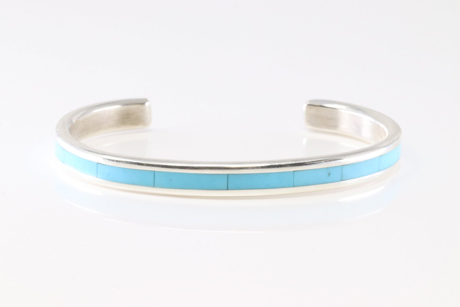 Native America Zuni Sterling Silver Turquoise Inlay Bracelet Cuff By Lorett.: This is a Native America Zuni Sterling Silver Turquoise Inlay Bracelet Cuff By Lorett. Stamp Lorett.