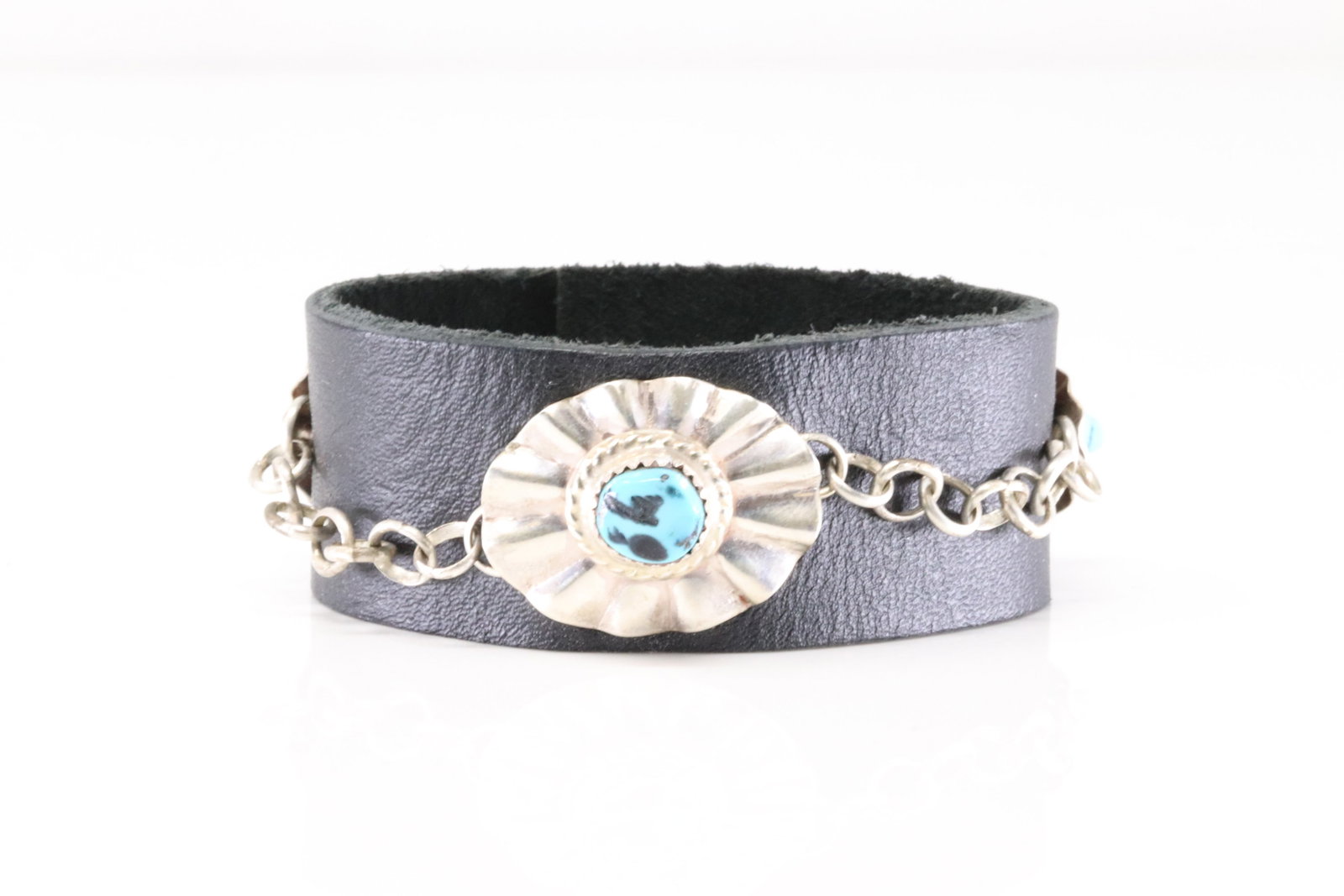 Native America Navajo Sterling Silver Turquoise Leather Bracelet By Jack Bencomo.: This is a Native America Navajo Sterling Silver Turquoise Leather Bracelet By Jack Bencomo. Bracelet Length: 8.00.
