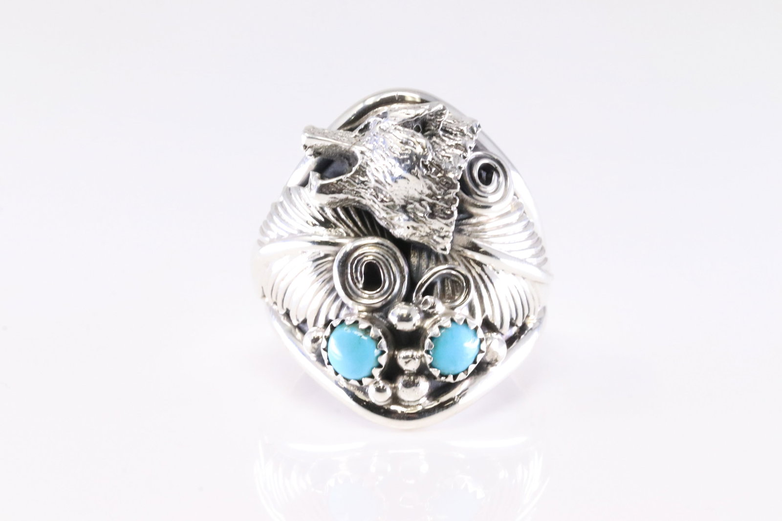 Native America Navajo Sterling Silver Turquoise Wolf Ring By Darrell Morgan.: This is a Native America Navajo Sterling Silver Turquoise Wolf Ring By Darrell Morgan. Ring size: 11.75.