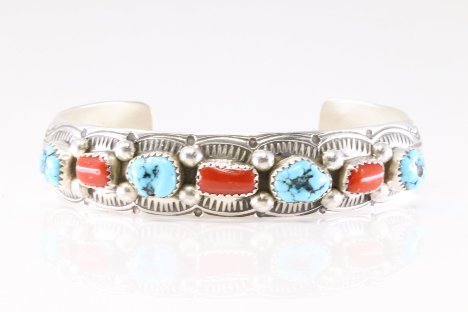 Native America Navajo Sterling Silver Coral & Turquoise Bracelet Cuff By GS.: This is a Native America Navajo Sterling Silver Coral & Turquoise Bracelet Cuff By GS. Stamp GS.