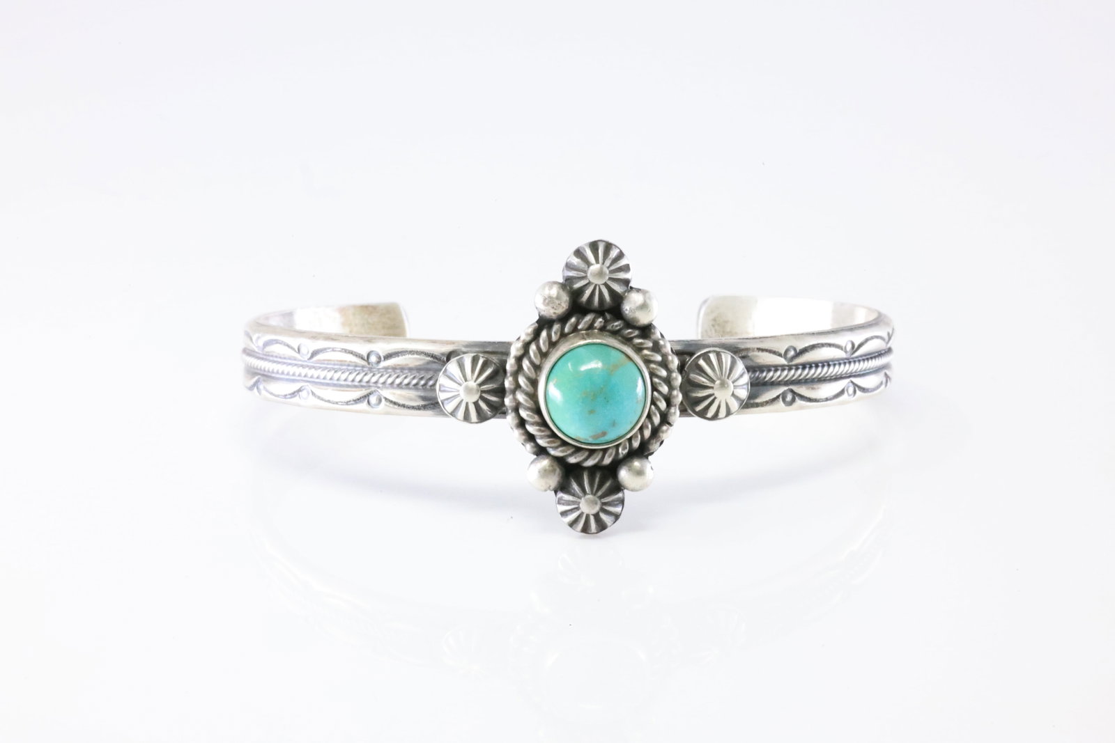 Native America Navajo Sterling Silver Turquoise Bracelet Cuff By MC.: This is a Native America Navajo Sterling Silver Turquoise Bracelet Cuff By MC. Stamp MC.