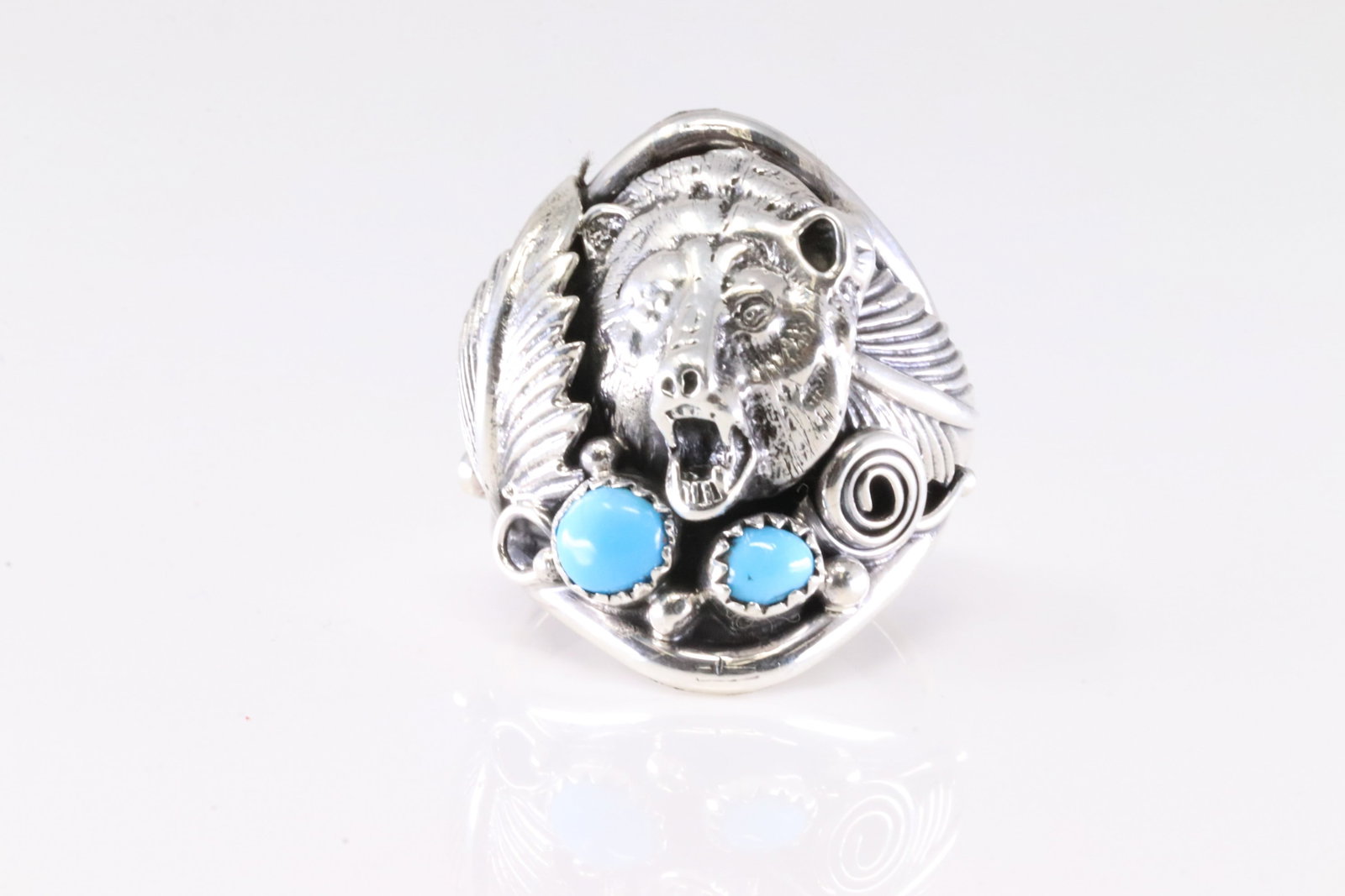 Native America Navajo Sterling Silver Turquoise Bear Casted Ring By Darrell Morgan.: This is a Native America Navajo Sterling Silver Turquoise Bear Casted Ring By Darrell Morgan. Ring size: 10.75.