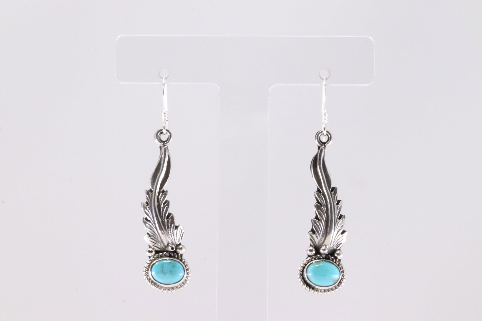 America Sterling Silver Turquoise Feather Dangling Earring's.: This is a America Sterling Silver Turquoise Feather Dangling Earring's.