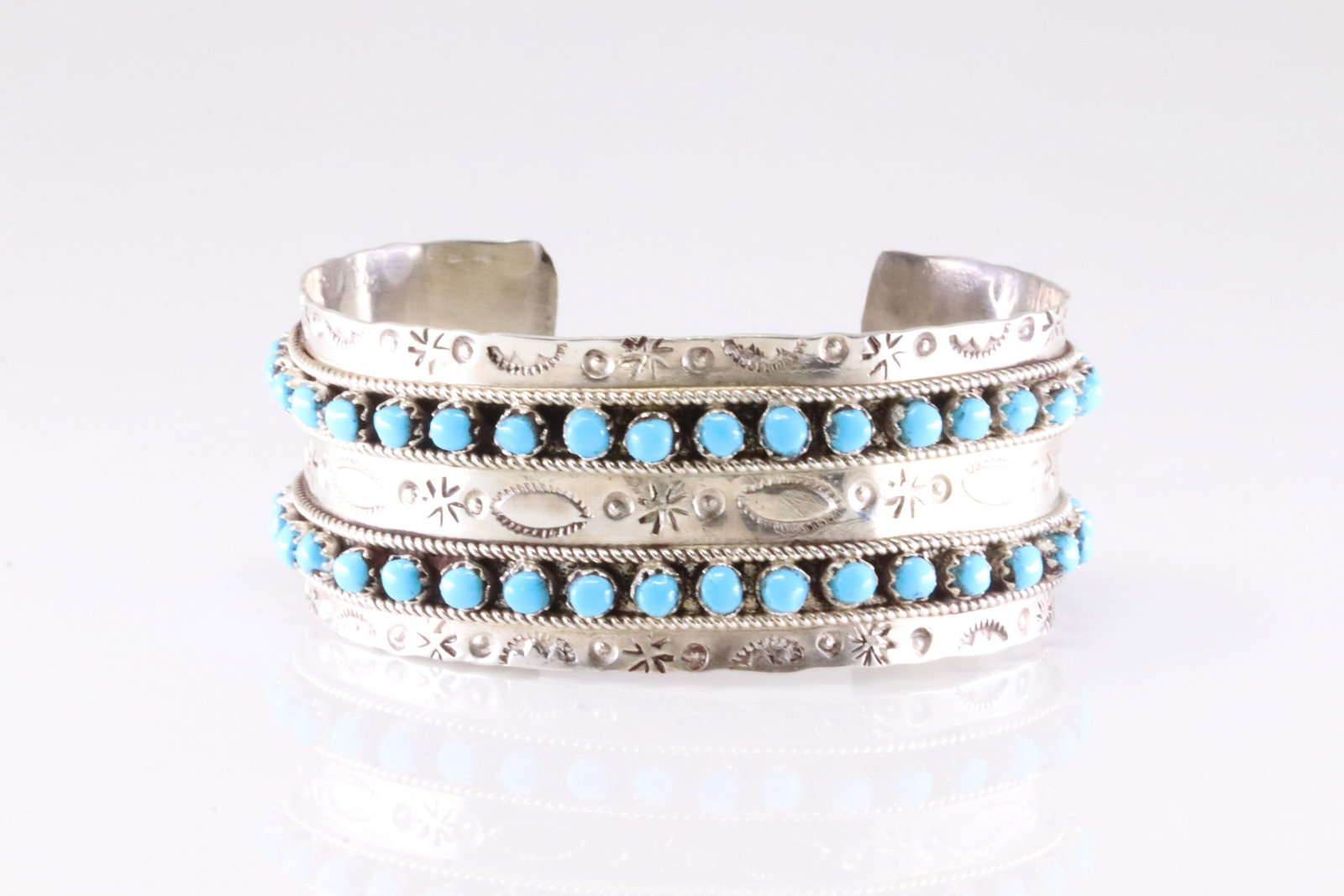 Native America Zuni Sterling Silver Turquoise Bracelet Cuff By Pearl Ukestine.: This is a Native America Zuni Sterling Silver Turquoise Bracelet Cuff By Pearl Ukestine.