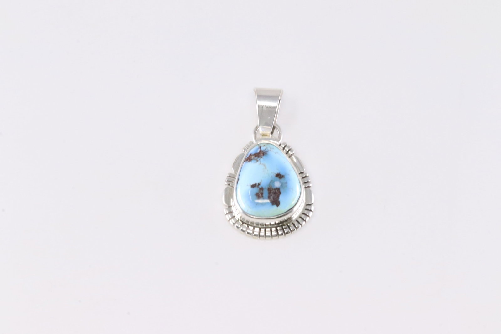 Native America Navajo Sterling Silver Golden Hill Turquoise Pendant By N.J.: This is a Native America Navajo Sterling Silver Golden Hill Turquoise Pendant By N.J.