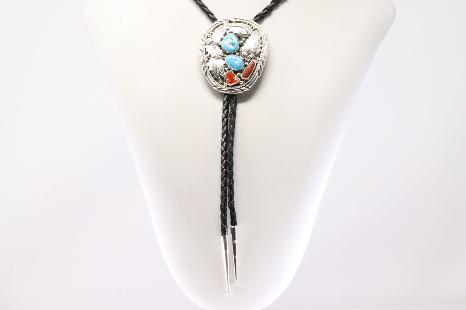 Native America Navajo Sterling Silver Coral & Turquoise Bolo Necklace By Julia Etsitty.: This is a Native America Navajo Sterling Silver Coral & Turquoise Leaf Bolo Necklace By Julia Etsitty. Necklace length: 42.00"
