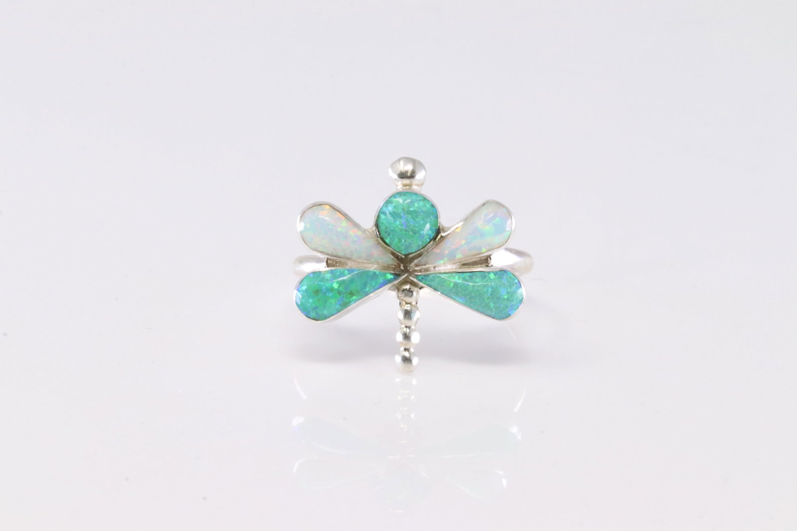 America Sterling Silver Green & White Opal Dragonfly Ring.: This is a America Sterling Silver Green & White Opal Dragonfly Ring. Ring size: 8.50.