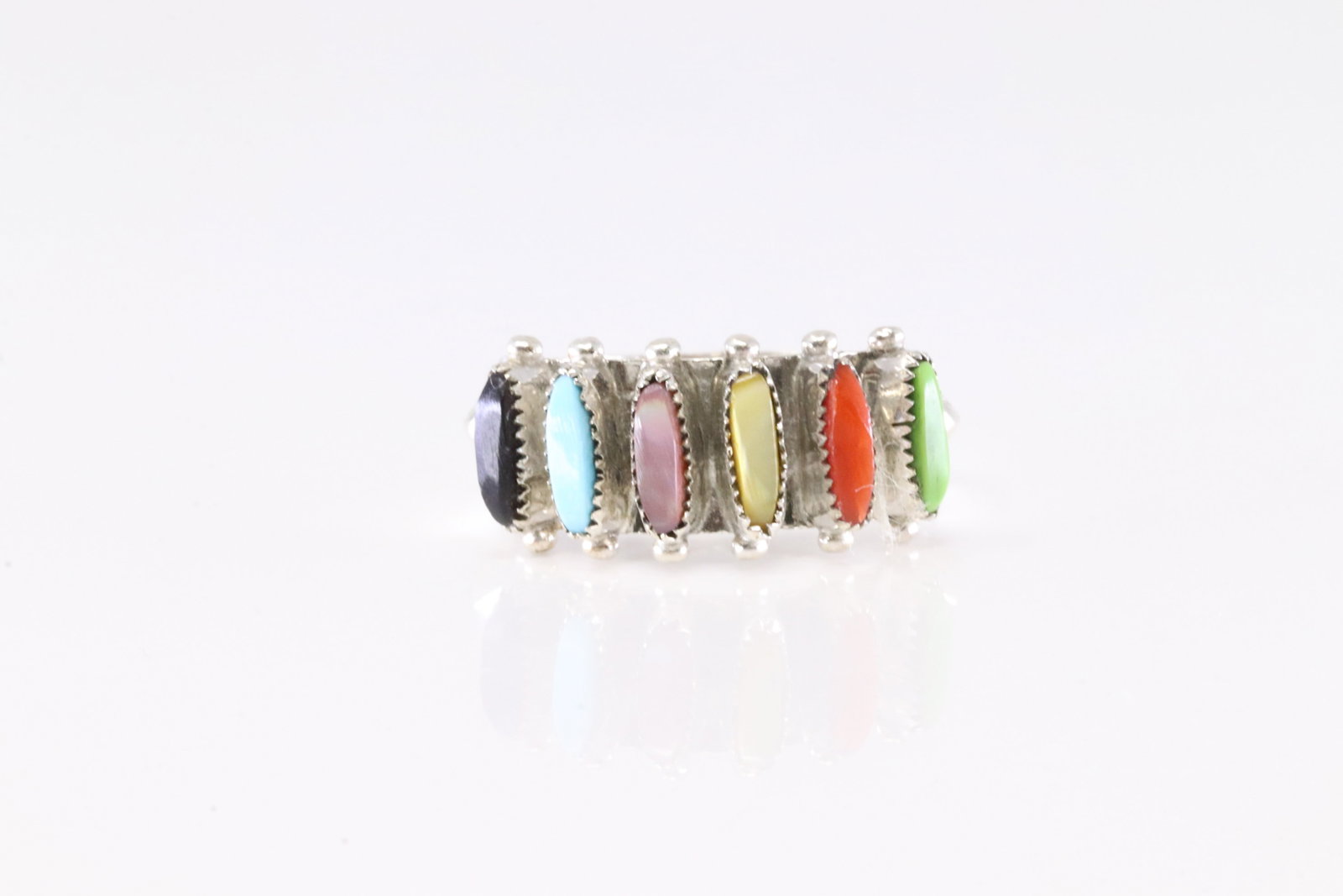 Native America Zuni Sterling Silver Multi-Color Stone Ring By Paloma.: This is a Native America Zuni Sterling Silver Multi-Color Stone Ring By Paloma. Ring size: 7.50.