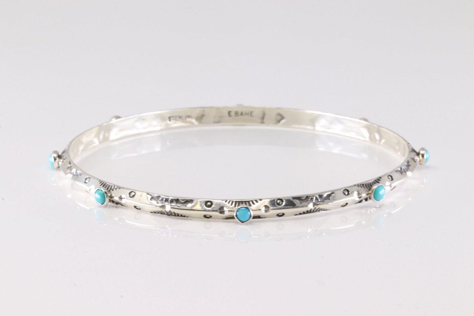 Native America Navajo Sterling Silver Turquoise Bangel Bracelet Cuff By E Bahe.: This is a Native America Navajo Sterling Silver Turquoise Bangel Bracelet Cuff By E Bahe. Stamp E Bahe.