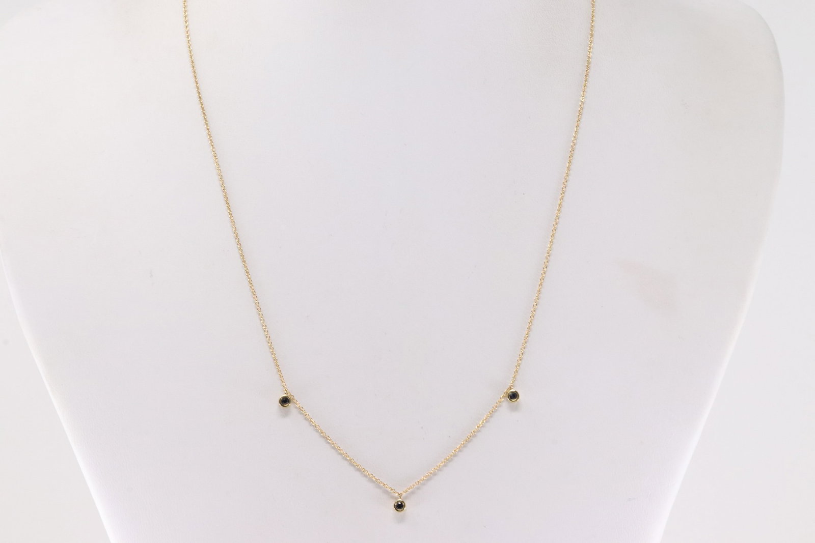 Sapphire By The Yard Necklace 14Kt.: Ladies 14Kt Yellow Gold Sapphire By The Yard Necklace. This By The Yard Design Necklace has 3 Blue round Sapphires. Sapphires weight: 0.10ctw. Necklace length: 18.00"