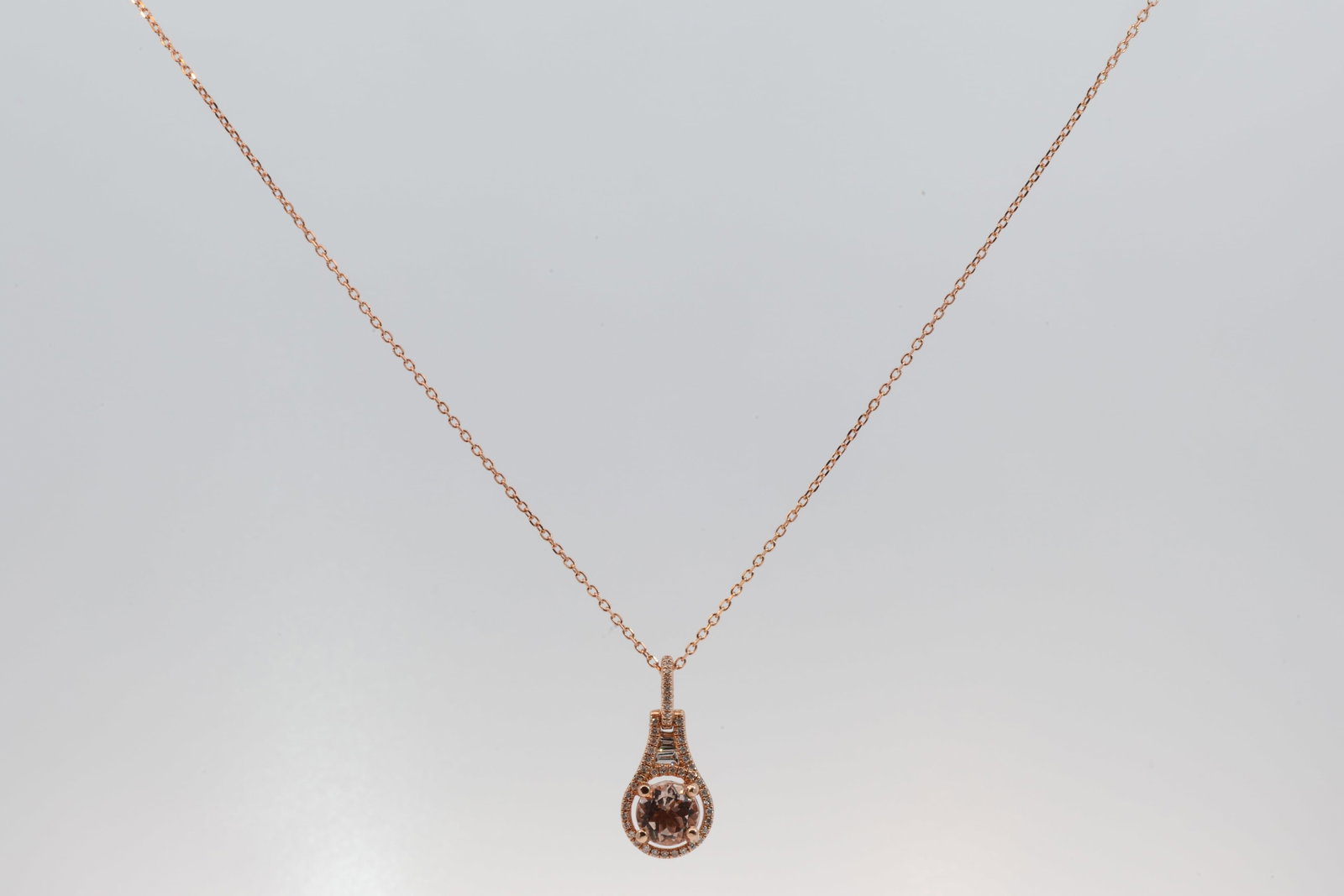 Morganite & Diamond Pendant Necklace/ 14Kt.: Ladies 14Kt Rose Gold Morganite Diamond Halo Pendant / Necklace. Pendant has Round & Baguette Brillant Cut Diamonds.Completed With a 14Kt Rose Gold Chain Necklace. 1 MG: 82ct Necklace Length: 18.00"