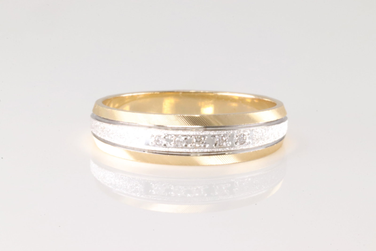 Wedding Diamond Ring 14Kt.: 14Kt Yellow Gold Wedding Diamond Ring. wedding band features a unique design that combines both yellow gold and white tones, with 5 diamonds. symbolizing the union of two lives. Ring size: 9.50. 4.00 