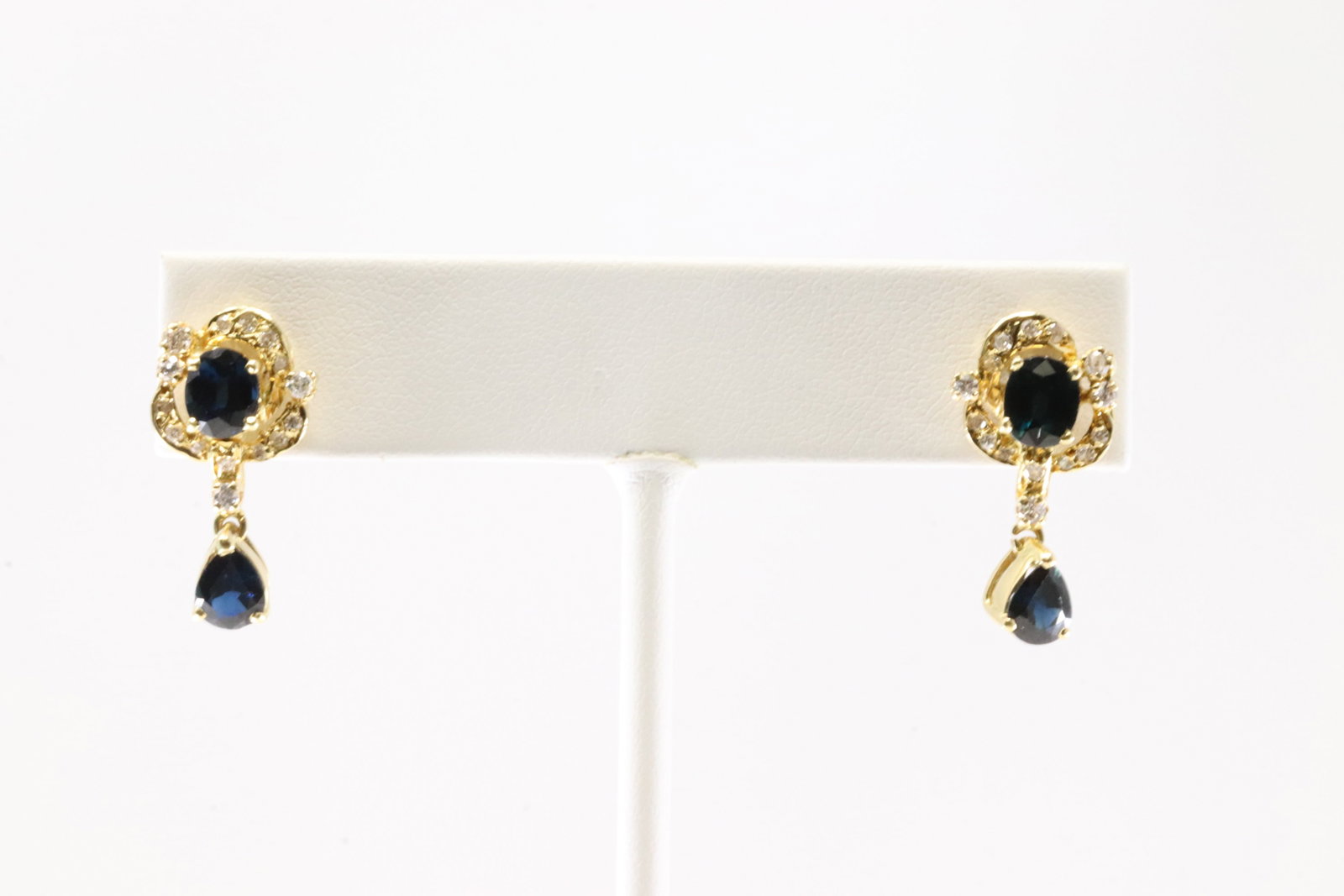 Sapphire & Diamond Stud Earring 14Kt.: Ladies 14Kt Yellow Gold Sapphire Diamond Stud Earring. This Elegant Earring's has 4 Gorgeous Blue Sapphire Gemstones With 30 Round Sparkling Diamonds. Diamond Approx Weight: 0.35 ctw Total Weight: