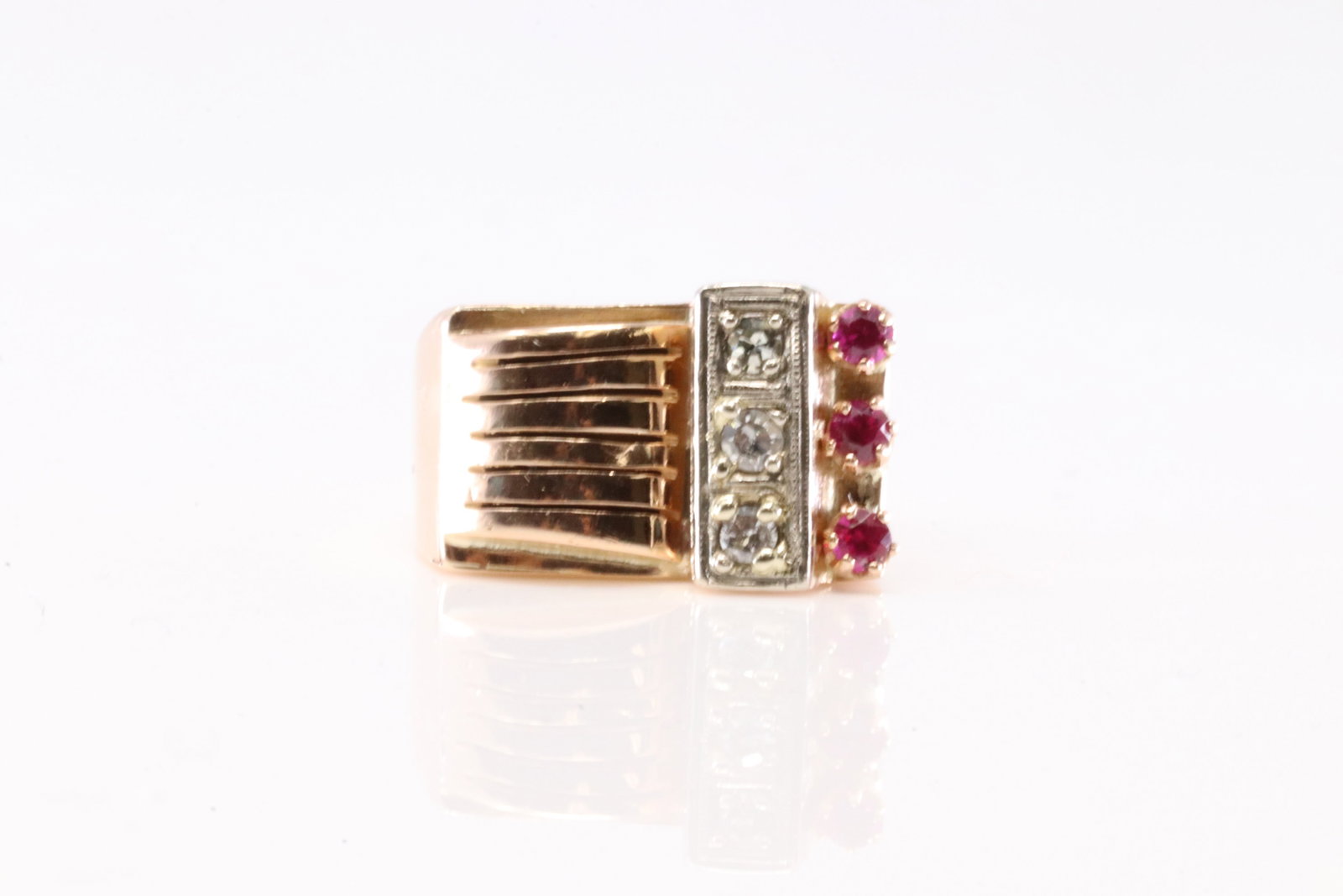Rose Gold Ruby & Diamond Ring Platinum / 14K.: Platinum / 14Kt Rose Gold Ruby & Diamond Ring. This Elegant Ring has 3 Pink Rubies with 3 Sparkling Diamonds. Ring size: 3.75. Total weight: 4.82 Grams.