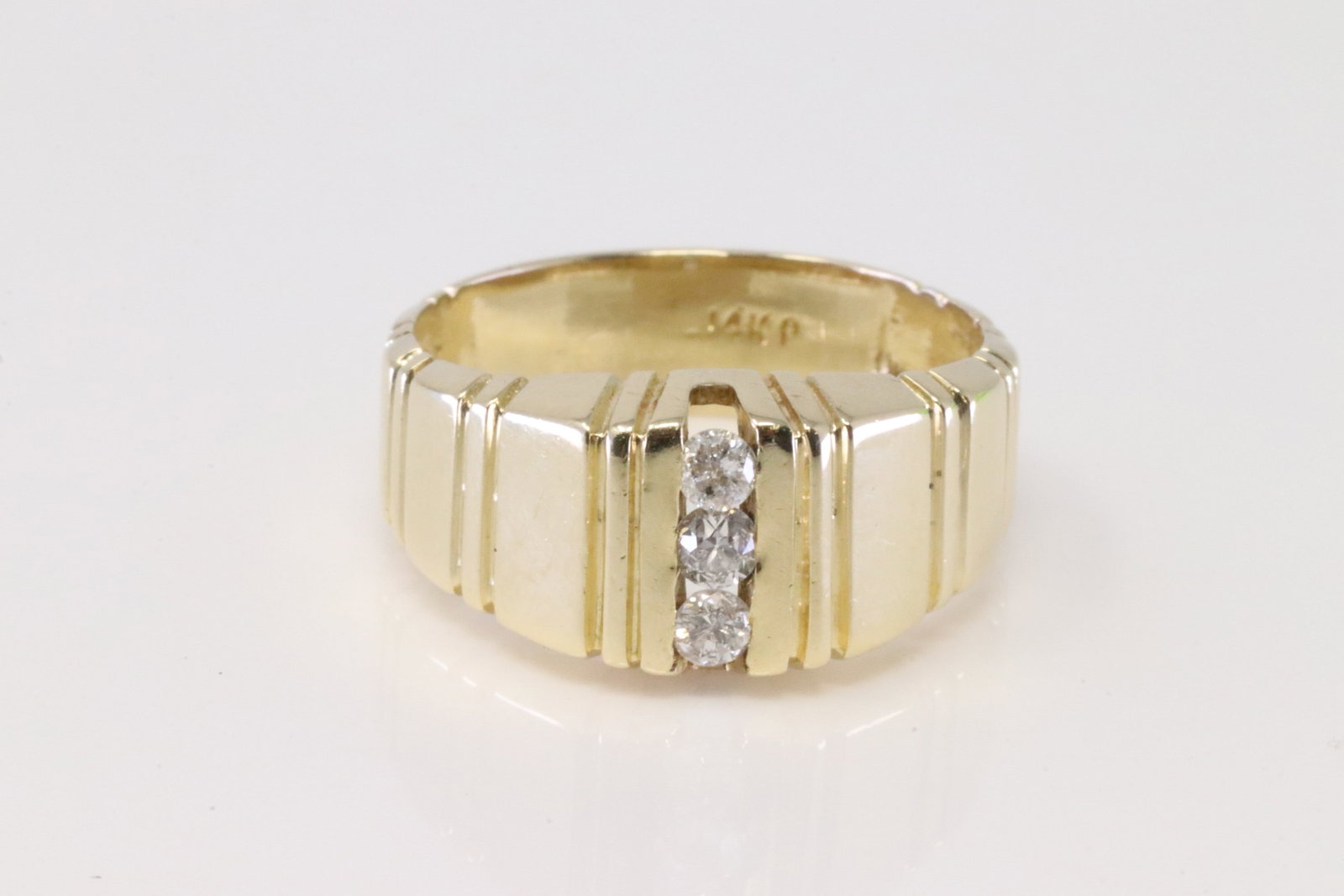 Diamond Ring 14Kt.: 14Kt Yellow Gold Diamond Ring. Ring has 3 Diamonds. Diamonds weight: 0.25ctw. Ring size: 8.25. Total weight: 6.30 Grams.