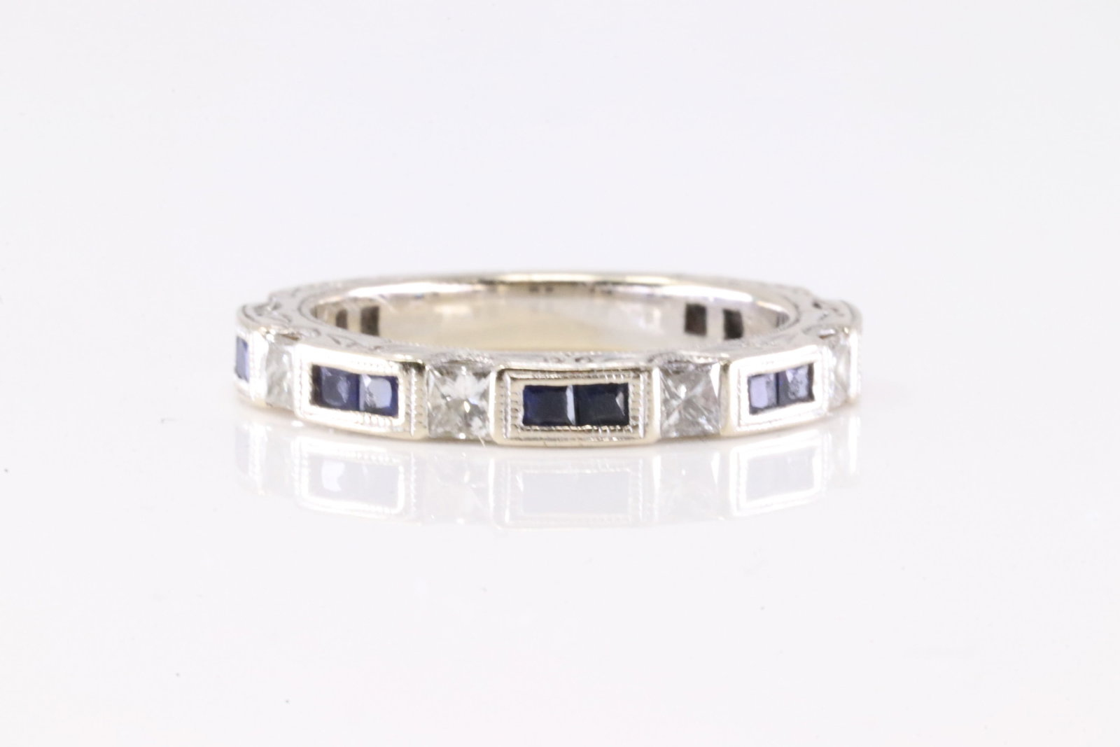 Sapphire & Diamond Ring 14Kt.: 14Kt White Gold Sapphire & Diamond Ring. This Elegant Ring has Sapphires Gemstone with Sparkling Diamonds. Ring size: 5.75. Total weight: 3.56 Grams.