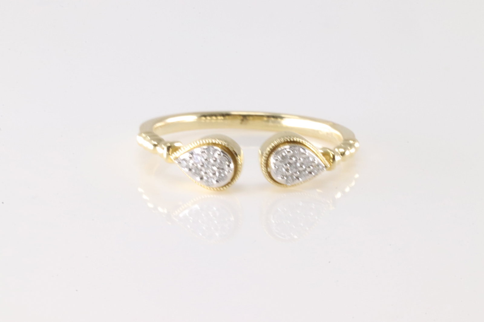 Diamond Open Ring 14Kt.: Ladies 14Kt Yellow Gold Diamond Open Ring. This Elegant Ring has 16 Sparkling Diamonds. Diamonds weight: 0.08ctw. Ring size: 6.50.