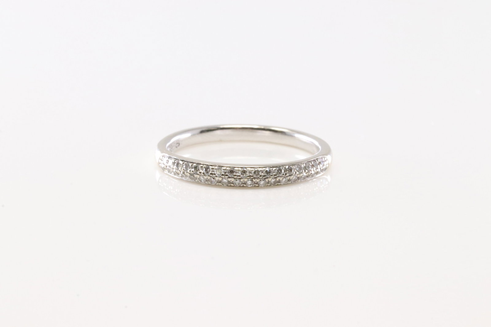 Diamond Ring 14Kt.: Ladies 14Kt White Gold Diamond Ring. This Charming Ring has 34 Round Sparkling Diamonds. Ring Size: 6.50.