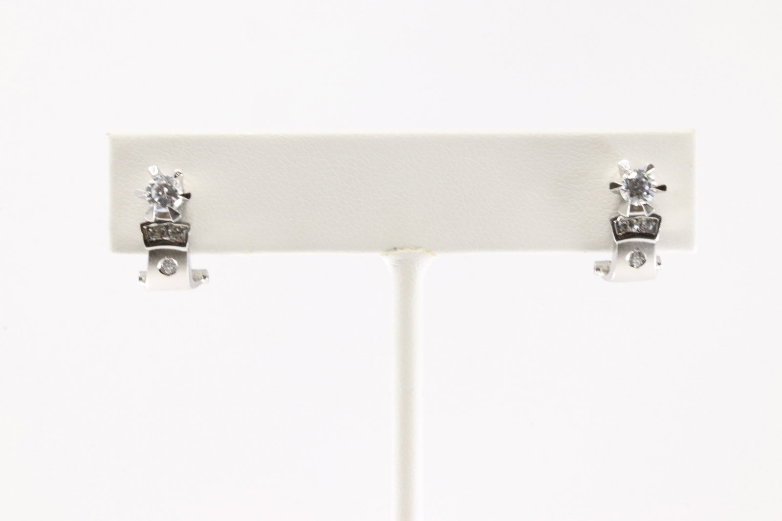 Diamond French Clip Earring 14Kt.: Ladies 14Kt White Gold Diamond French Clip Earring. This Earring has 8 Round Sparkling Diamonds. Diamond Weight Approx: 0.866ctw. Total Weight: 3.00 Grams