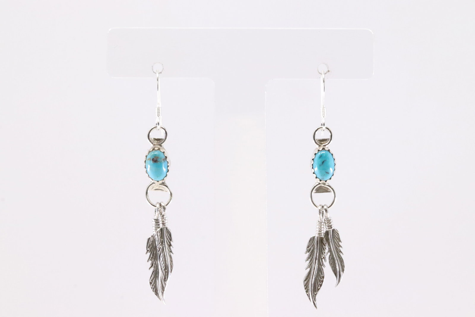 America Sterling Silver Turquoise Dangling Feather Earring's.: This is a America Sterling Silver Turquoise Dangling Feather Earring's.